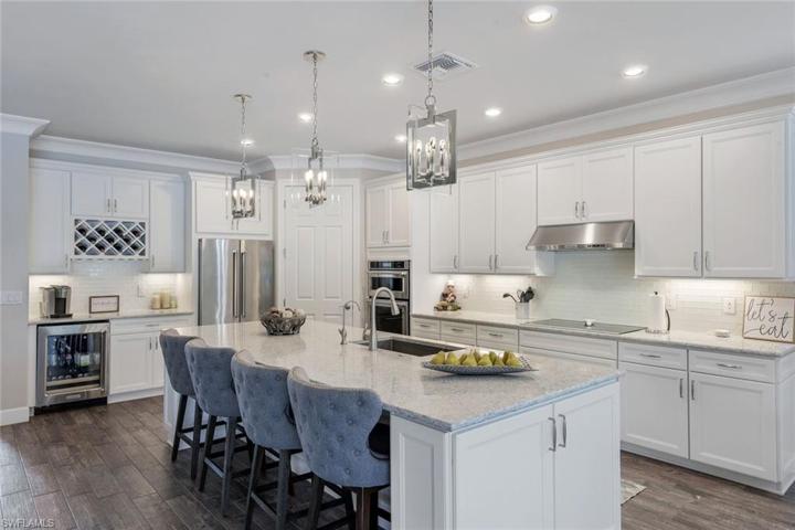 Built in entertainment area with wine storage and beverage fridge.