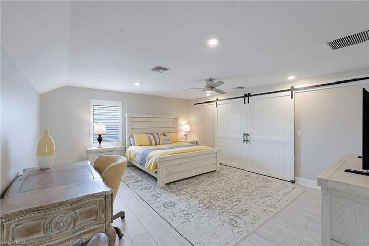 Bedroom 4 in loft - with custom oversized storage closets added