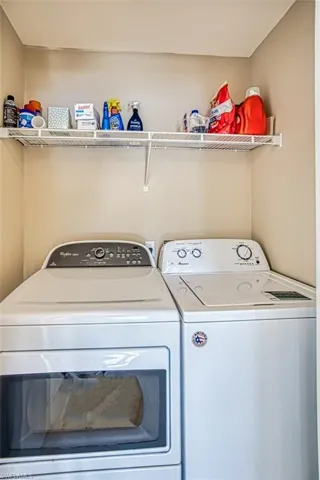 Laundry area with separate washer and dryer