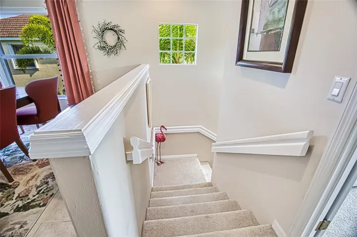 Stairway featuring baseboards