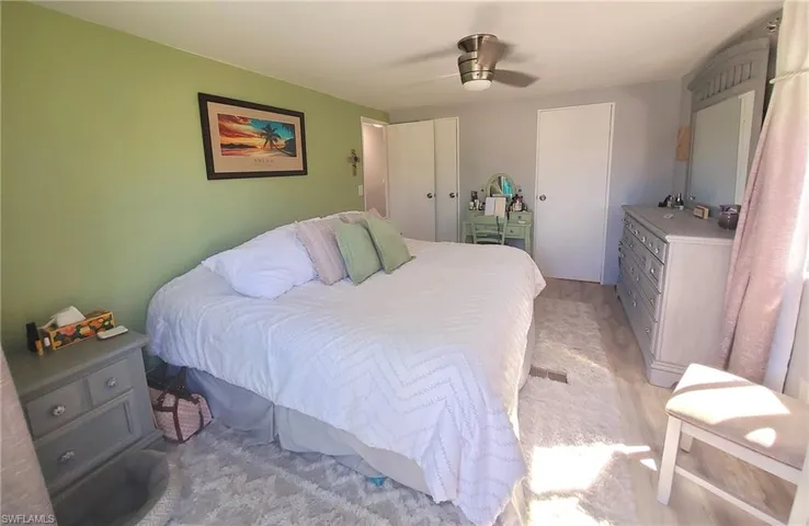 Primary bedroom with walk-in closet and ensuite.