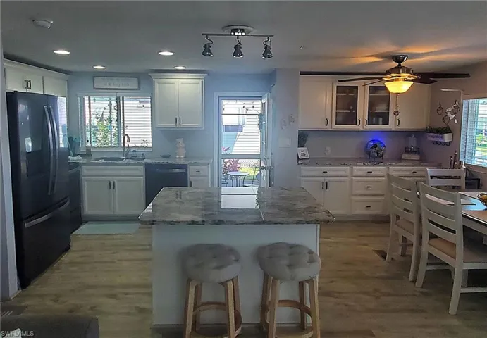 Designer kitchen featuresNew subfloors & New Lifeproof laminate flooring.