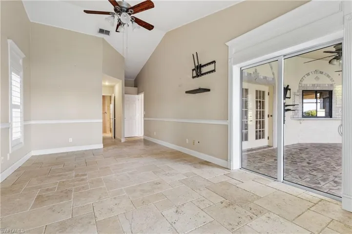 Master bedroom with sliders to the screened lanai