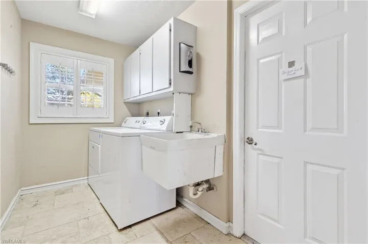Inside laundry with access to the garage