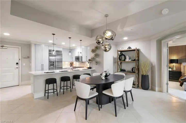 9115  Strada  PL, Naples, FL 34108
