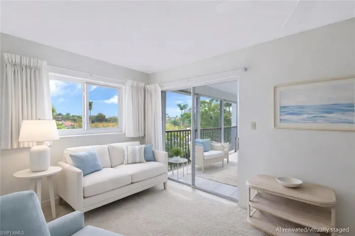 AI renovated/virtually staged. View of carpeted living area