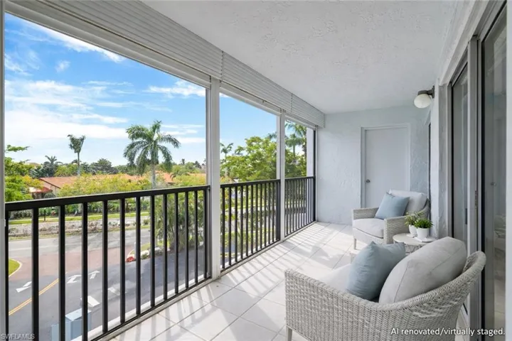 AI renovated/virtually staged.  View of balcony