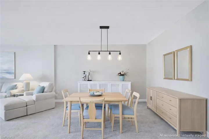 AI renovated/virtually staged. Dining space with carpet and baseboards