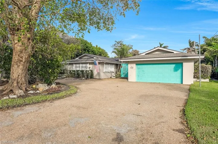 This home is priced at lot value, but the existing house could be restored.