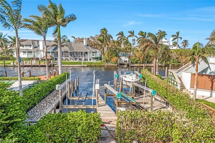 The deeded boat dock is on the far right (shown with a boat in place)