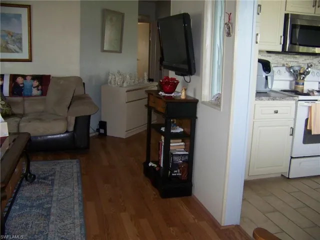 Living room/kitchen entry.