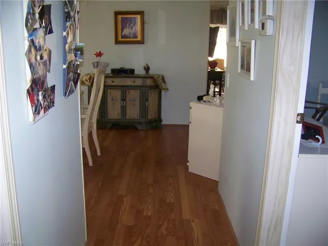 Hallway from bedrooms/baths, great flooring!