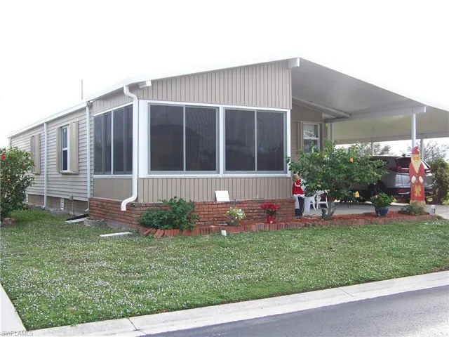Nice curb appeal, all accordion shutters and new lanai and carport.