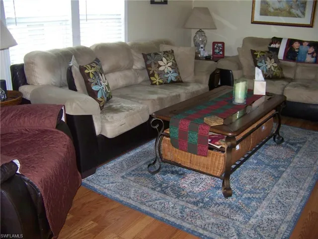 Living room, nice flooring, sold turnkey and ready to go!!!