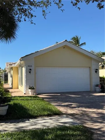 Single story home with a garage