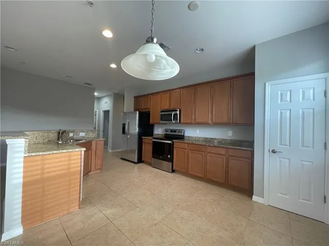 counters, and decorative light fixtures