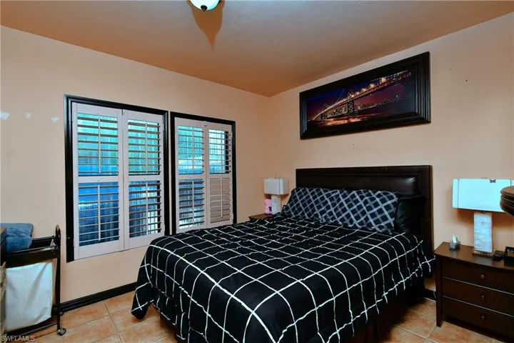 Bedroom with window covering