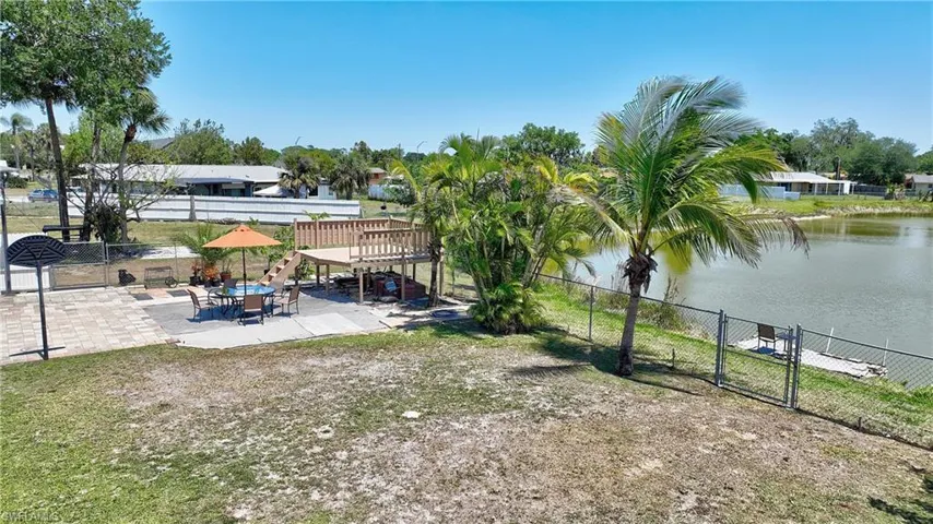 Back yard with serene view of the lake