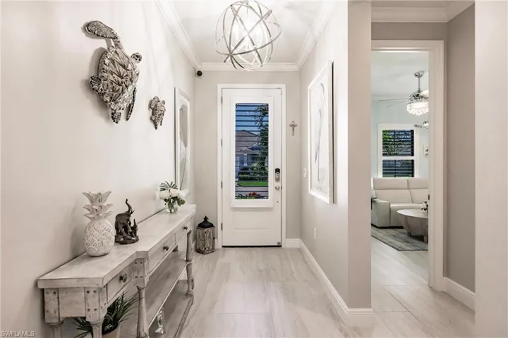 ALL over-sized plank, driftwood porcelain tile starts right in the foyer