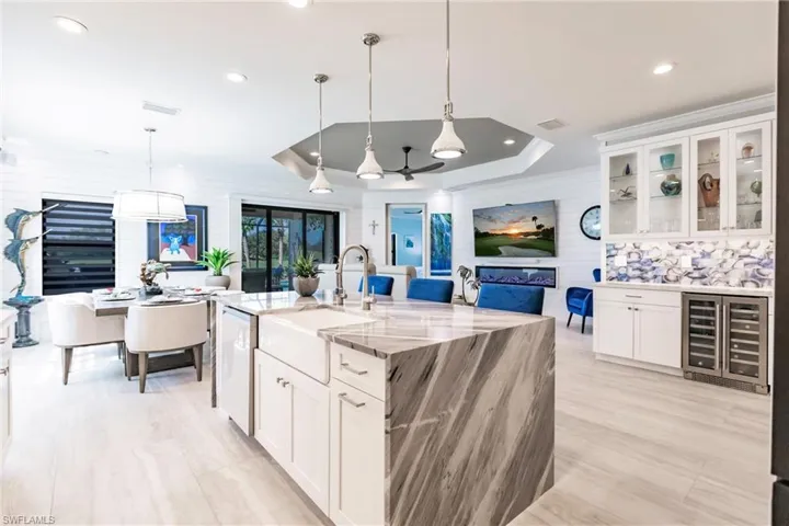 New granite waterfall island at counter height