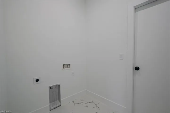 Laundry area with electric dryer hookup and hookup for a washing machine