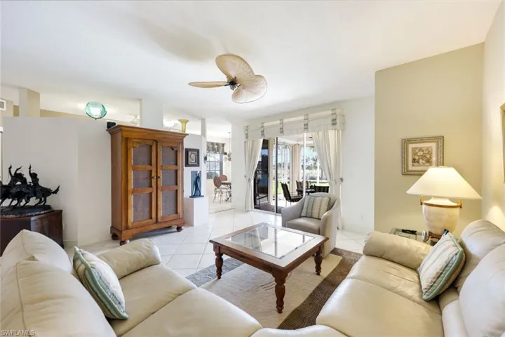 Tiled living room with ceiling fan