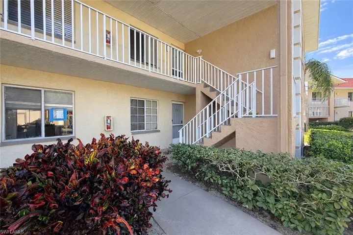 View of building exterior with stairs