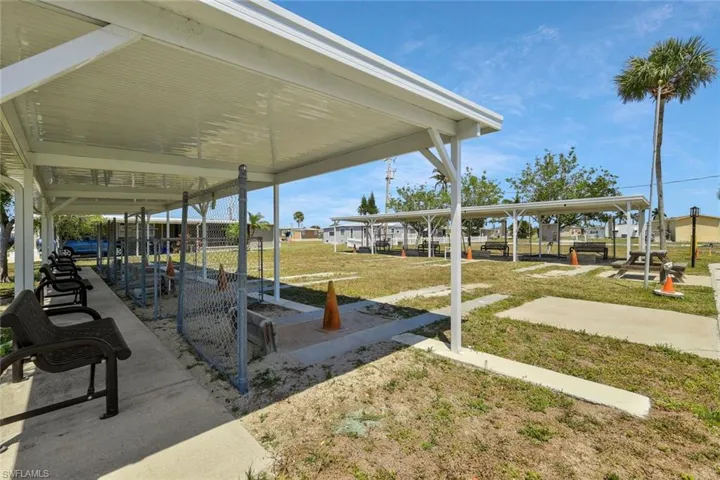 View of home's community featuring a yard
