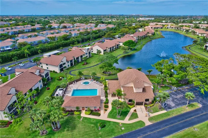 Main Clubhouse w/Pool and Pristine Lake w/ Pier and Fountain