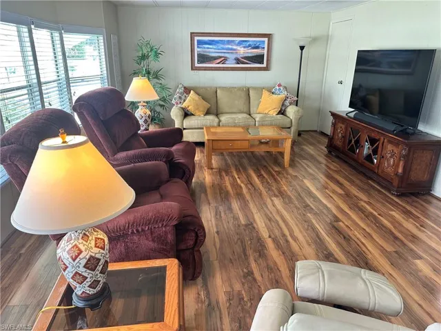 Living room featuring hardwood / wood-style flooring