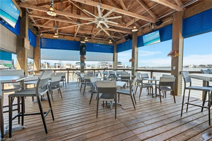 Wooden deck with a ceiling fan