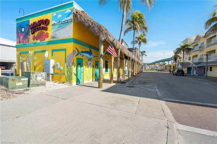 View of asphalt road with sidewalks