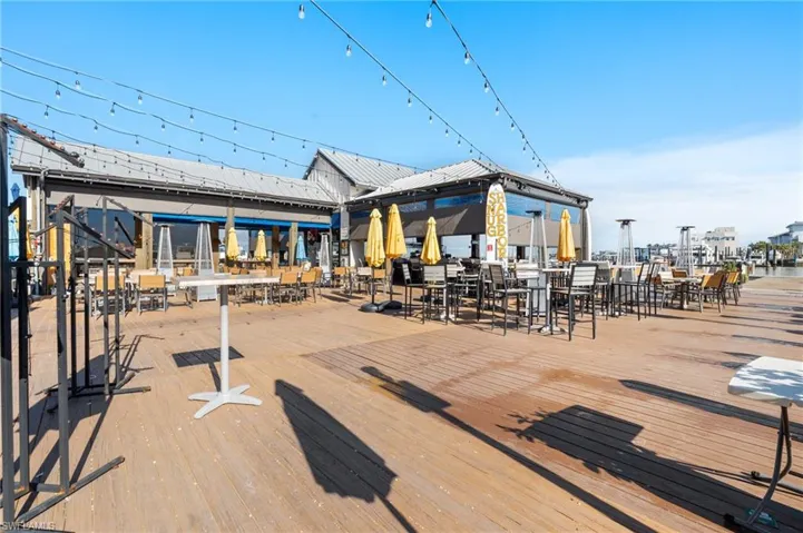 View of community featuring a rooftop deck