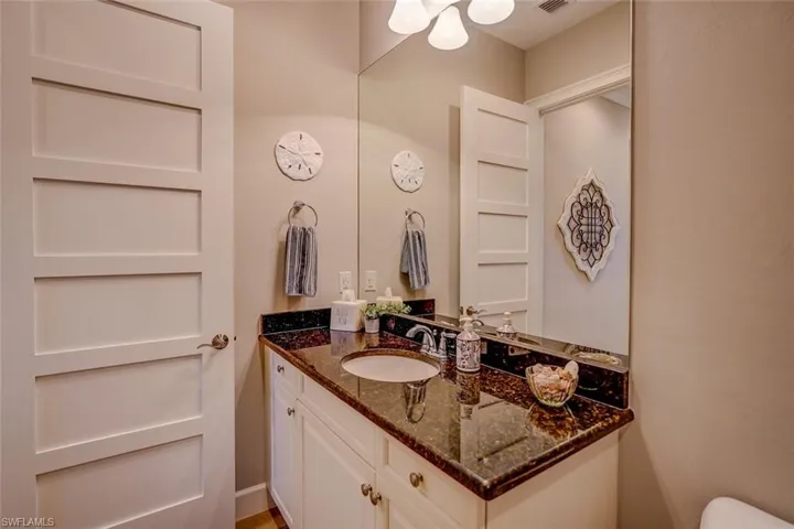 Half bath featuring vanity