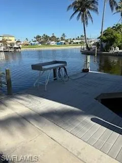 Dock featuring a water view