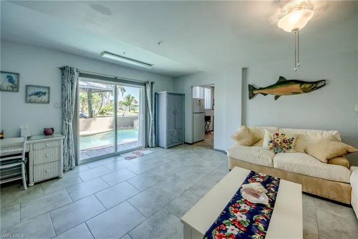 Living room featuring light tile patterned floors