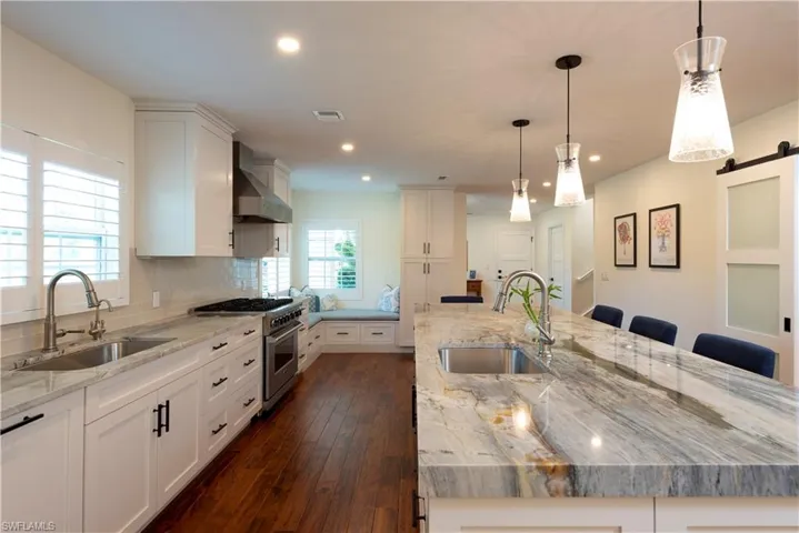 Kitchen featuring a sunny breakfast nook and island seating