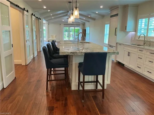 Kitchen island with storage and prep sink