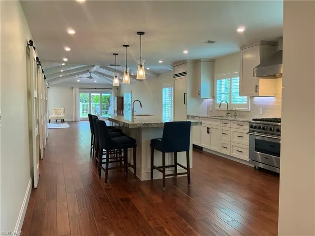 Kitchen loads of cabinet space and proximity to living areas