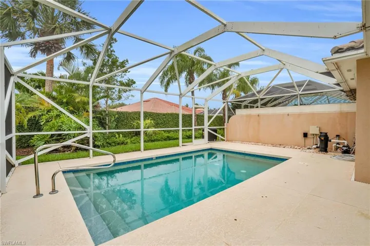 View of pool featuring a lanai and a patio area