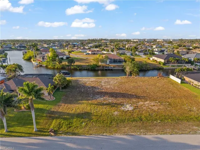 Aerial view of residential area with a nearby body of water