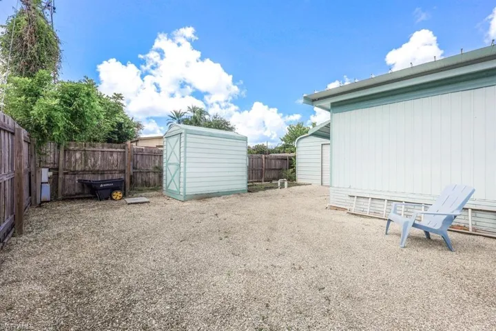 View of yard with a shed