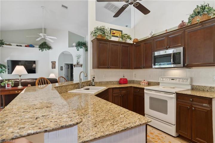 Large kitchen with breakfast bar.