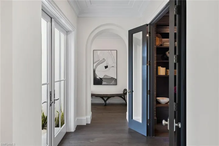 Hallway into library and into primary bedroom