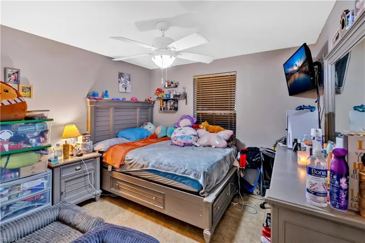 Bedroom featuring ceiling fan and light tile patterned floors
