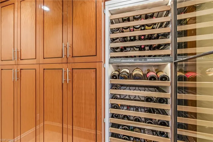 Wine room featuring wine cooler