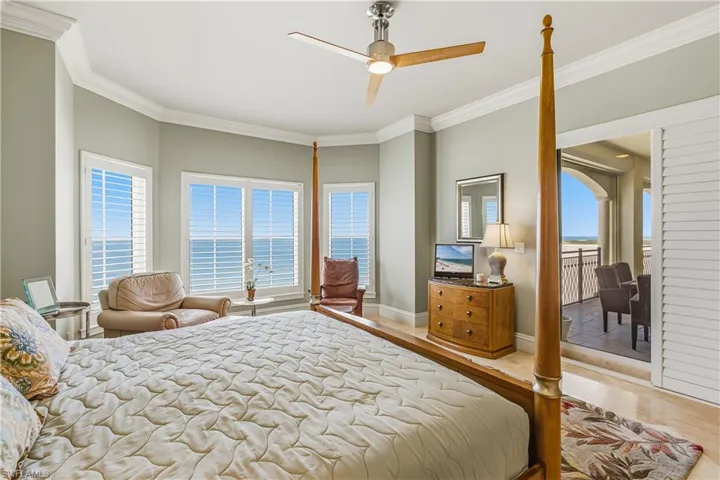 2nd Bedroom featuring ornamental molding and ceiling fan