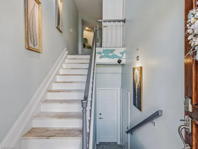 Entry Foyer with Marble Staircase