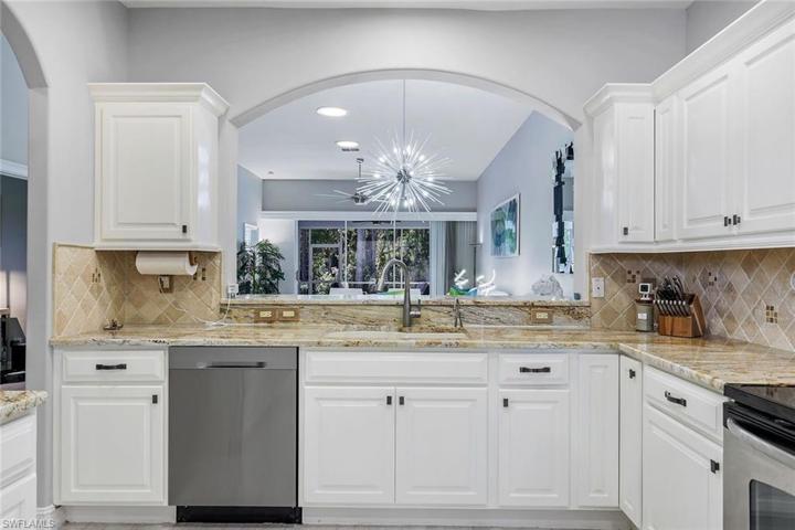 Kitchen sink overlooking living areas.