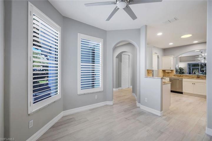 Clean updated plantation shutters throughout